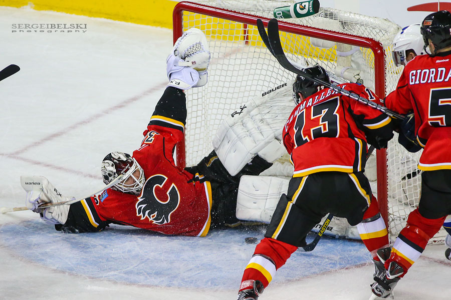 nhl hockey calgary flames vs st. louis blues sergei belski photo