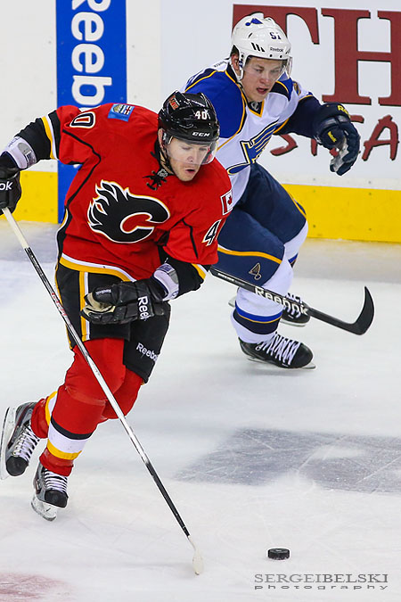 nhl hockey calgary flames vs st. louis blues sergei belski photo