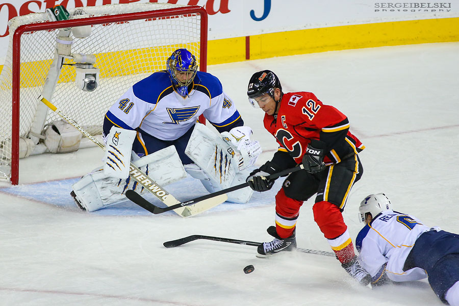 nhl hockey calgary flames vs st. louis blues sergei belski photo