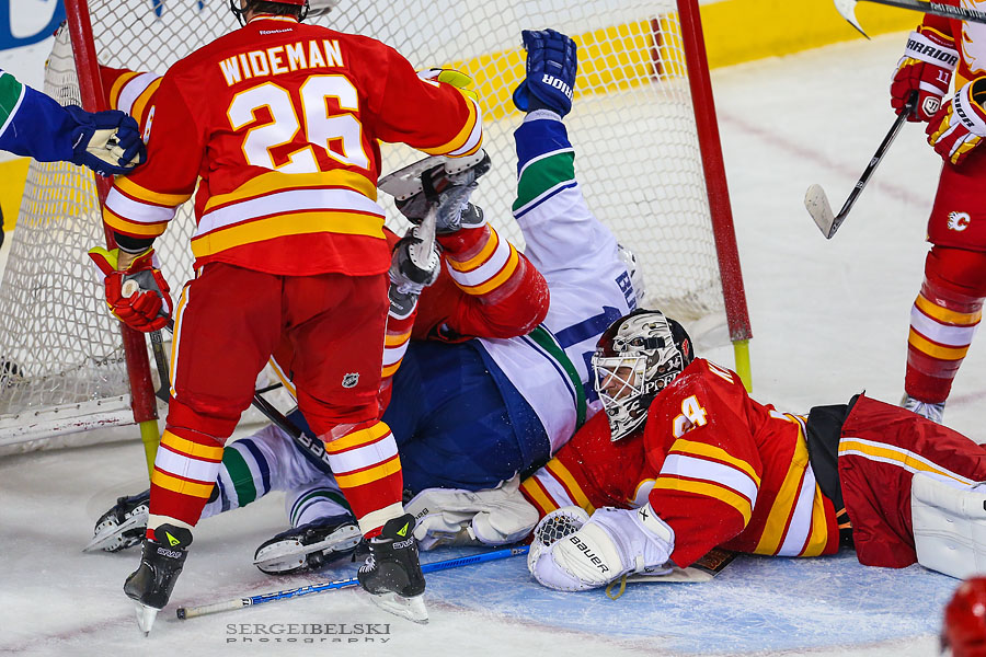 nhl hockey calgary flames vs vancouver canucks sergei belski photo