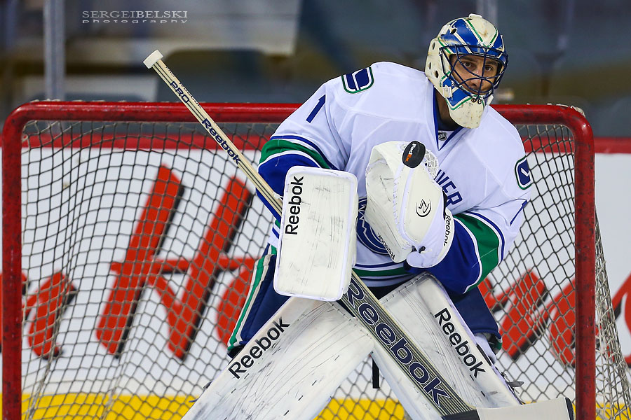 nhl hockey calgary flames vs vancouver canucks sergei belski photo