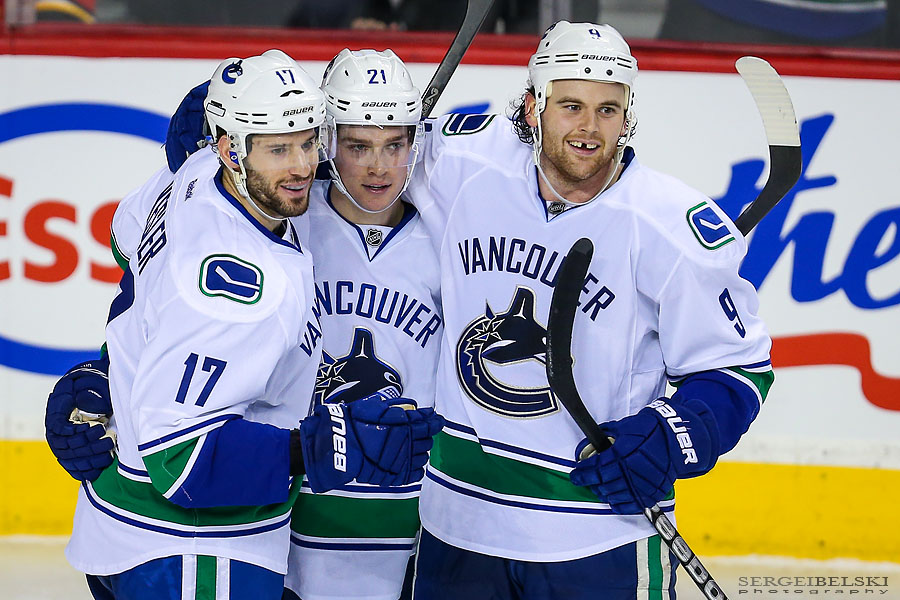 nhl hockey calgary flames vs vancouver canucks sergei belski photo