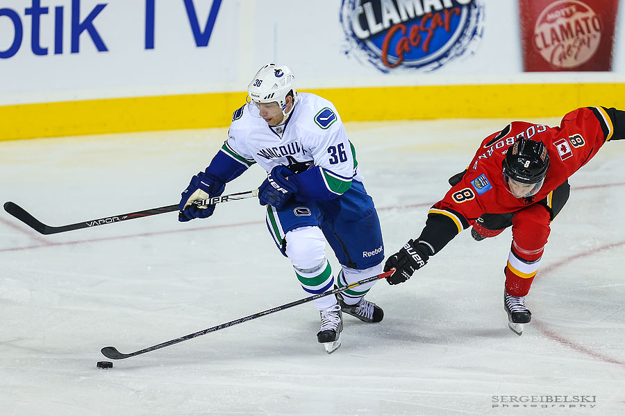 nhl hockey calgary flames vs vancouver canucks sergei belski photo