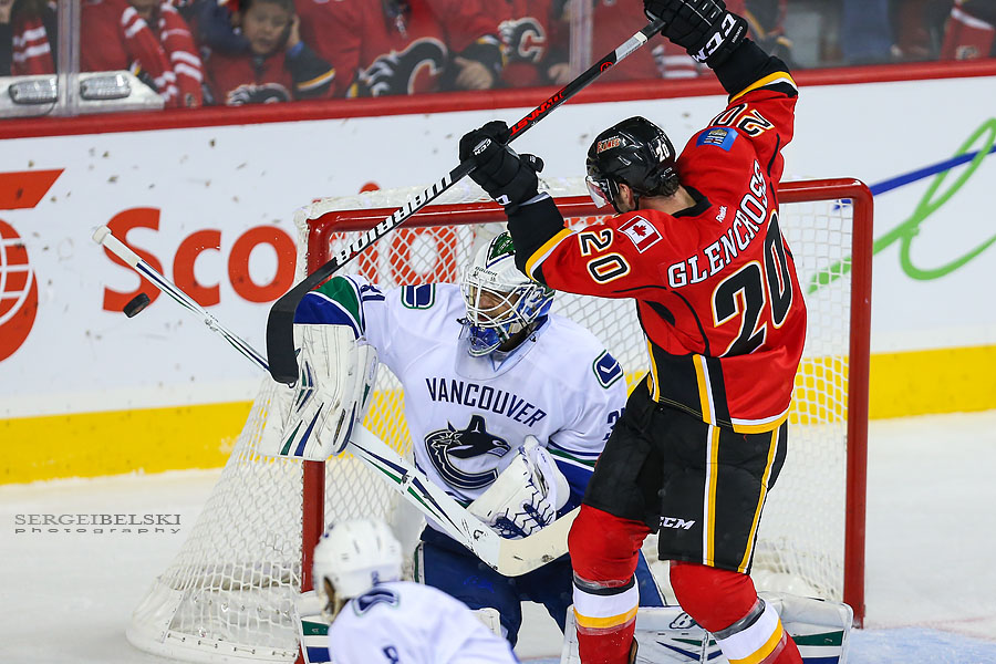nhl hockey calgary flames vs vancouver canucks sergei belski photo