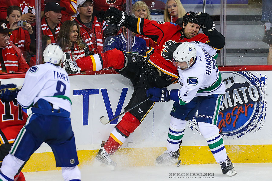 nhl hockey calgary flames vs vancouver canucks sergei belski photo