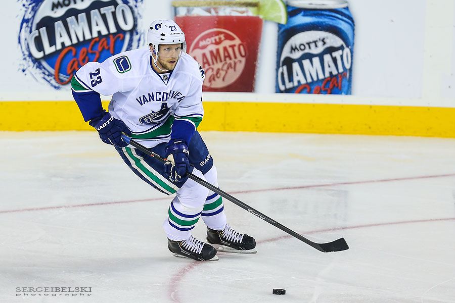 nhl hockey calgary flames vs vancouver canucks sergei belski photo