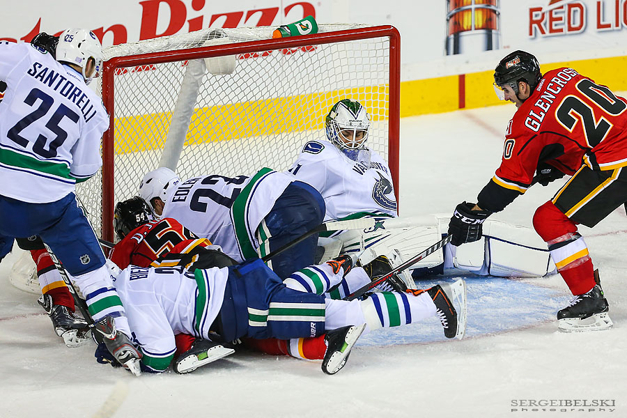 nhl hockey calgary flames vs vancouver canucks sergei belski photo