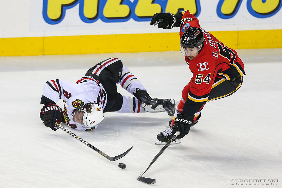 nhl hockey calgary flames vs chicago blackhawks sergei belski photo