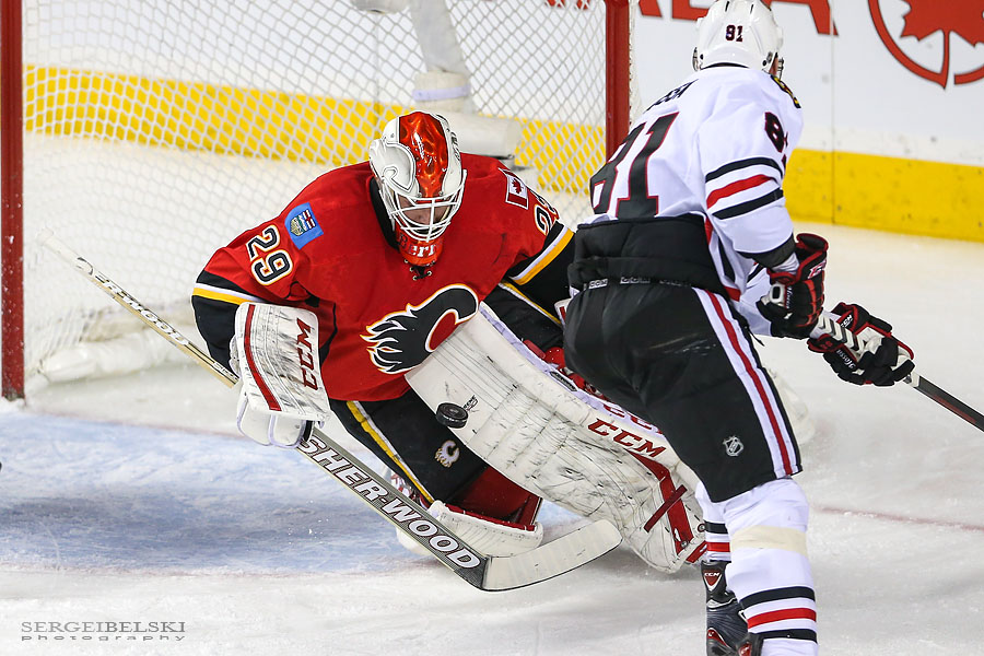 nhl hockey calgary flames vs chicago blackhawks sergei belski photo