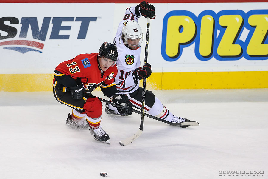 nhl hockey calgary flames vs chicago blackhawks sergei belski photo