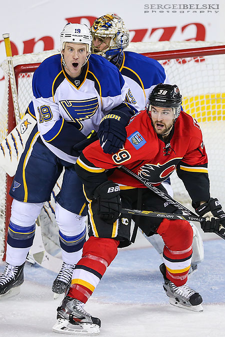 nhl hockey calgary flames vs st.louis blues sergei belski photo