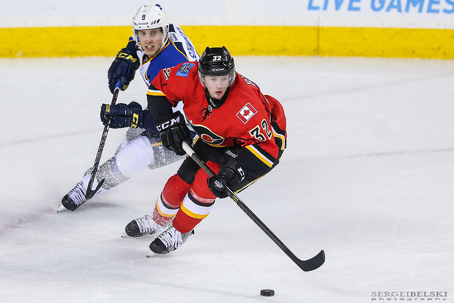 nhl hockey calgary flames vs st.louis blues sergei belski photo