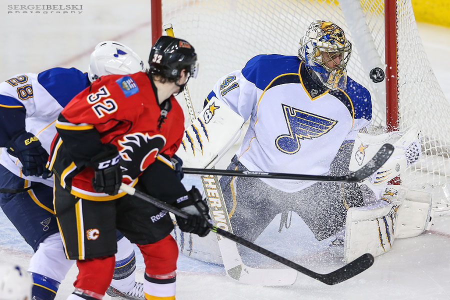 nhl hockey calgary flames vs st.louis blues sergei belski photo