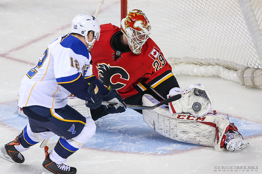 nhl hockey calgary flames vs st.louis blues sergei belski photo