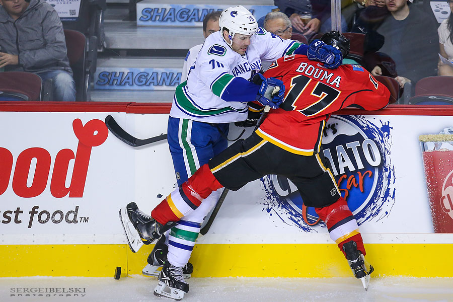 nhl hockey calgary flames vs vancouver canucks sergei belski photo