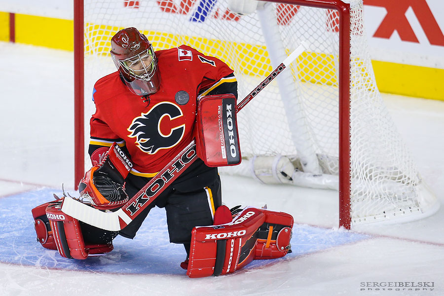 nhl hockey calgary flames vs vancouver canucks sergei belski photo