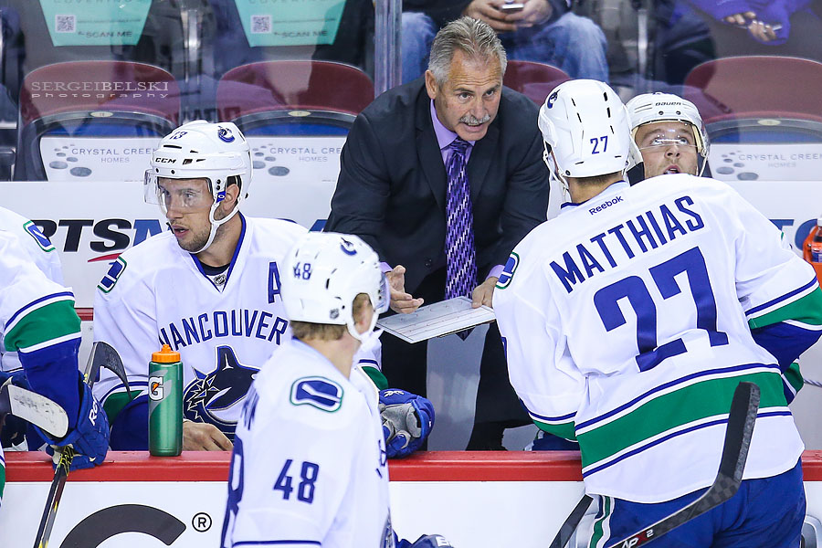 nhl hockey calgary flames vs vancouver canucks sergei belski photo