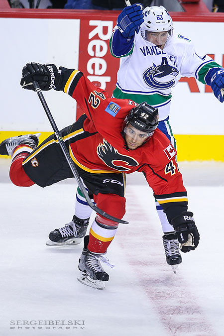 nhl hockey calgary flames vs vancouver canucks sergei belski photo
