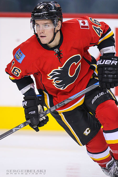 nhl hockey calgary flames vs vancouver canucks sergei belski photo