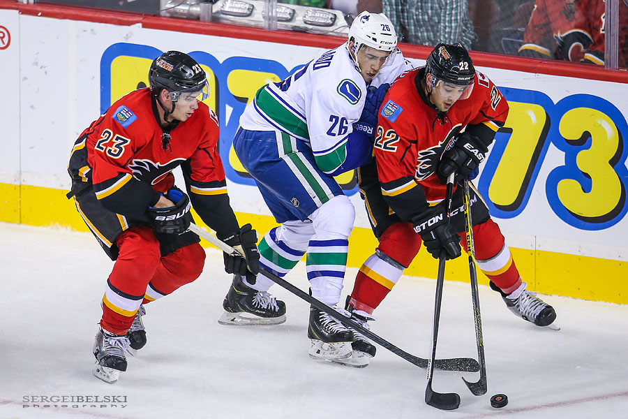 nhl hockey calgary flames vs vancouver canucks sergei belski photo