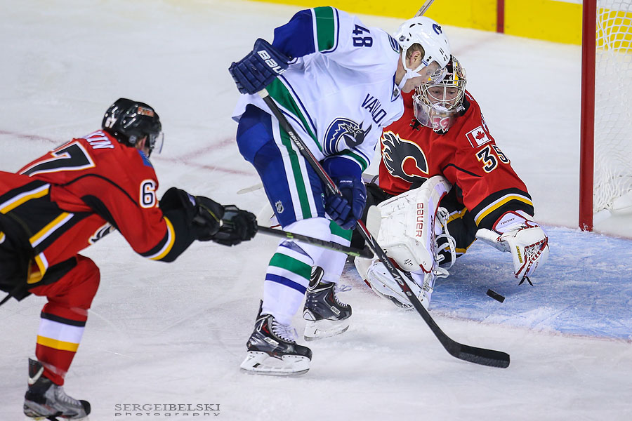 nhl hockey calgary flames vs vancouver canucks sergei belski photo