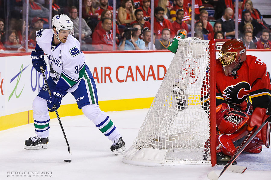 nhl hockey calgary flames vs vancouver canucks sergei belski photo