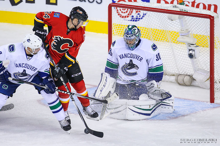 nhl hockey calgary flames vs vancouver canucks sergei belski photo