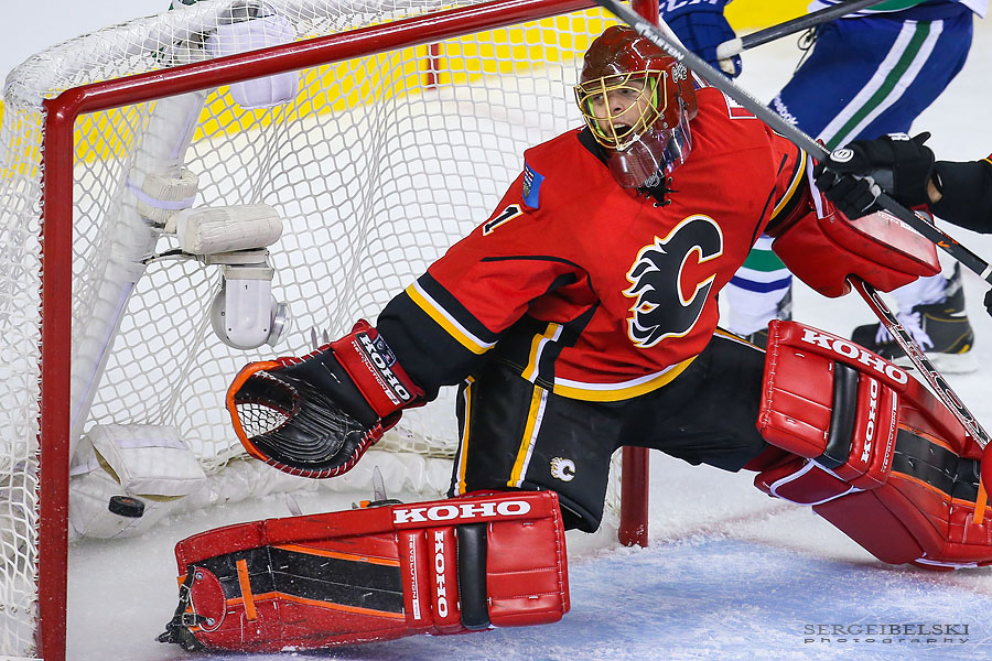 nhl hockey calgary flames vs vancouver canucks sergei belski photo