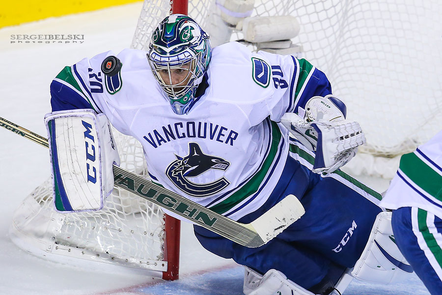 nhl hockey calgary flames vs vancouver canucks sergei belski photo