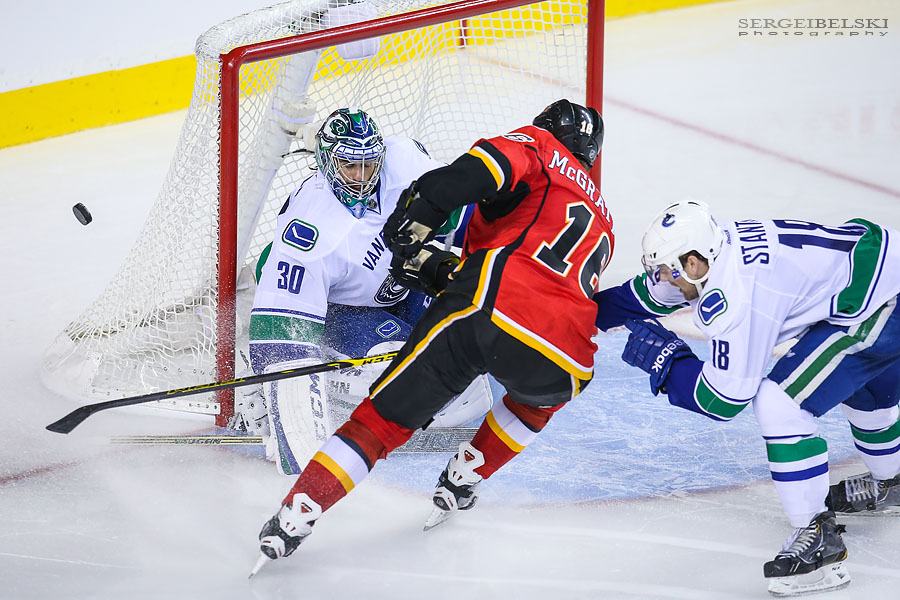 nhl hockey calgary flames vs vancouver canucks sergei belski photo