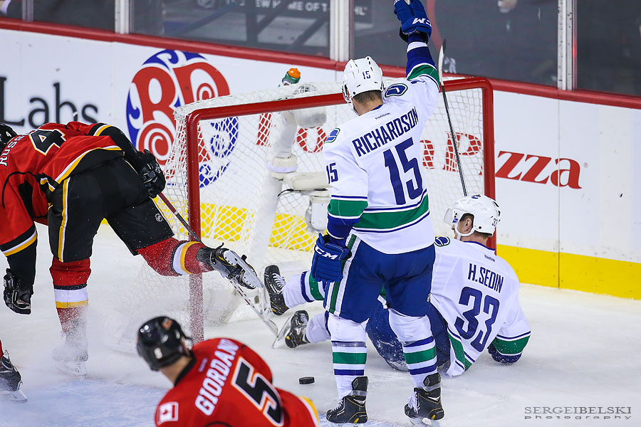 nhl hockey calgary flames vs vancouver canucks sergei belski photo